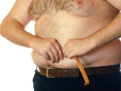 Removing fat from the abdomen in men